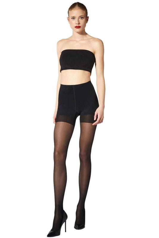 Model wearing a black strapless top and black tights with a darker brief design on a white background