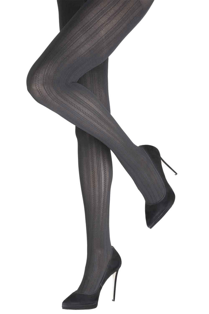 Gray cable  patterned tights worn with black high-heeled shoes on a white background