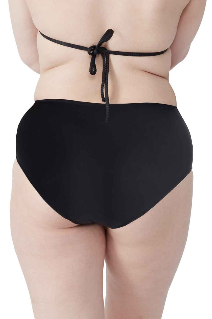Person wearing a black period swim full brief  on a white background