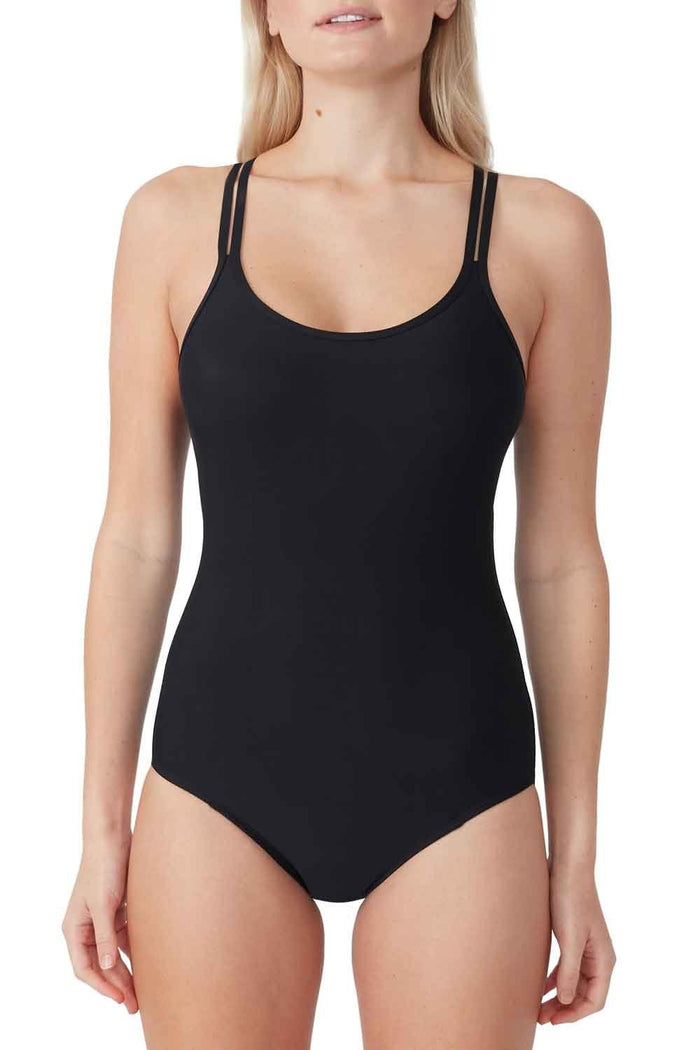 Black one-piece teens swimsuit worn by a model on a white background