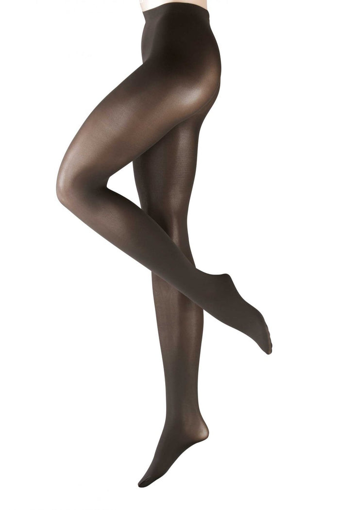 falke brown opaque tights worn by a model on a white background