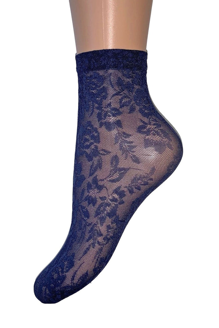 Lace ankle  sock on a mannequin foot against a white background