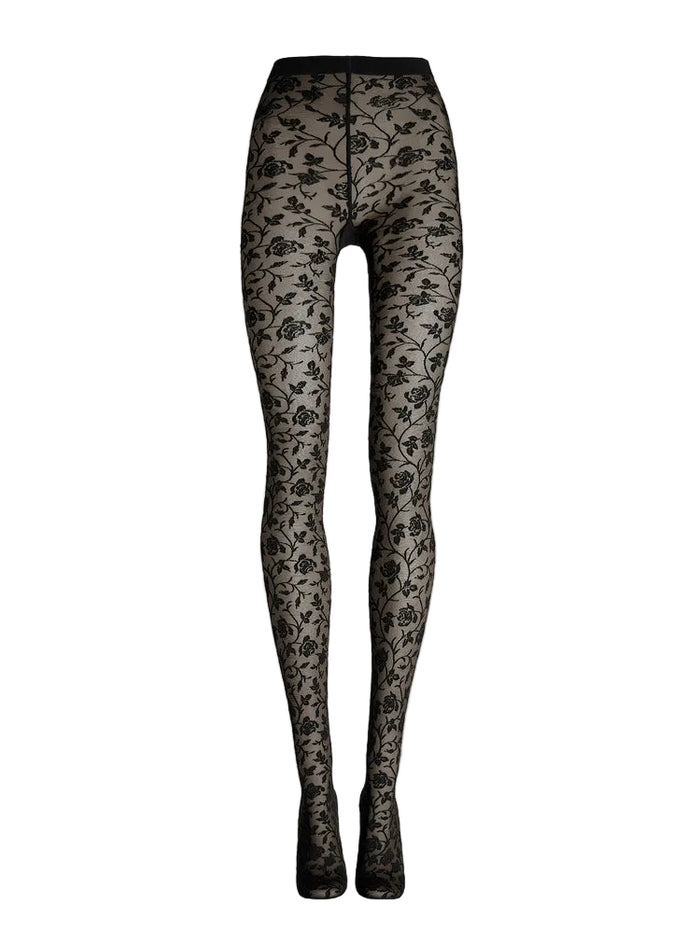 Black floral lace tights on a beige background