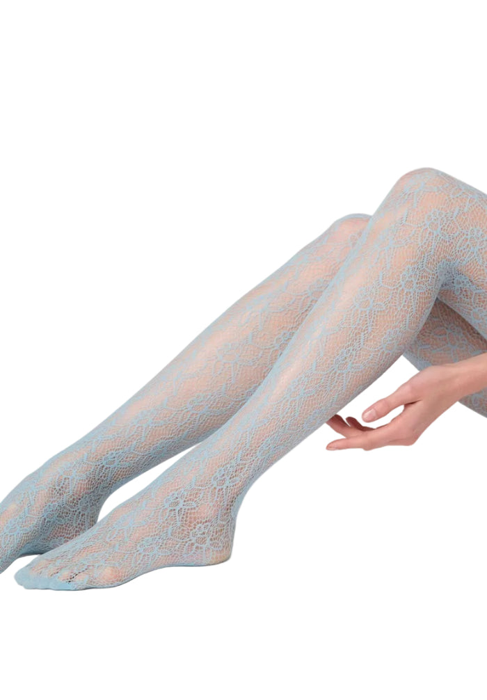 Net patterned sky coloured  tights worn by a person on a white background