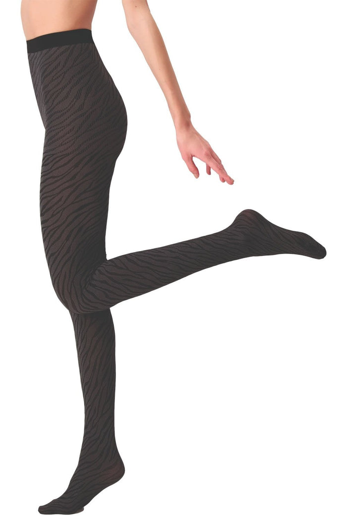 Grey patterned serpent  tights worn by a person on a white background