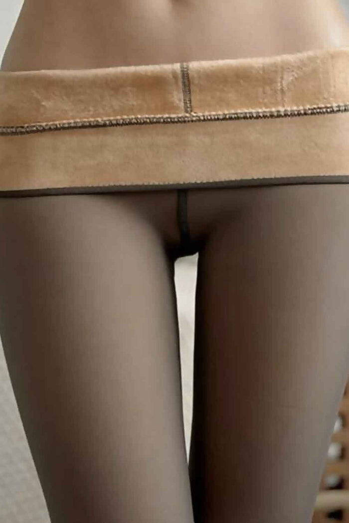 Close-up of fleece lined tights on  a white background