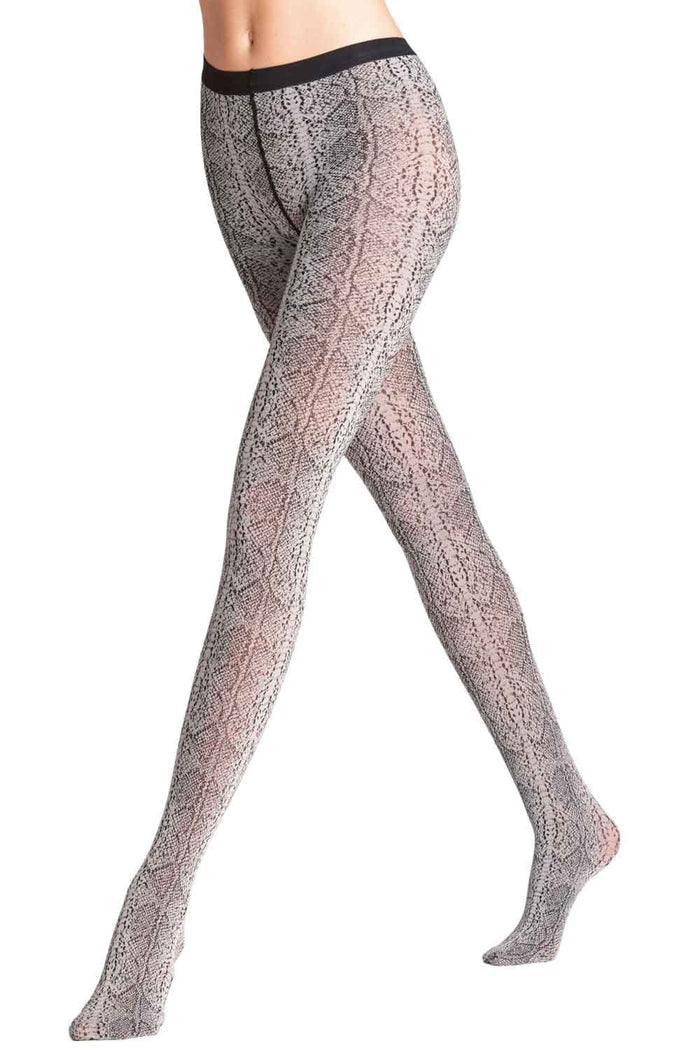 Snake print tights worn by a person on a white background
