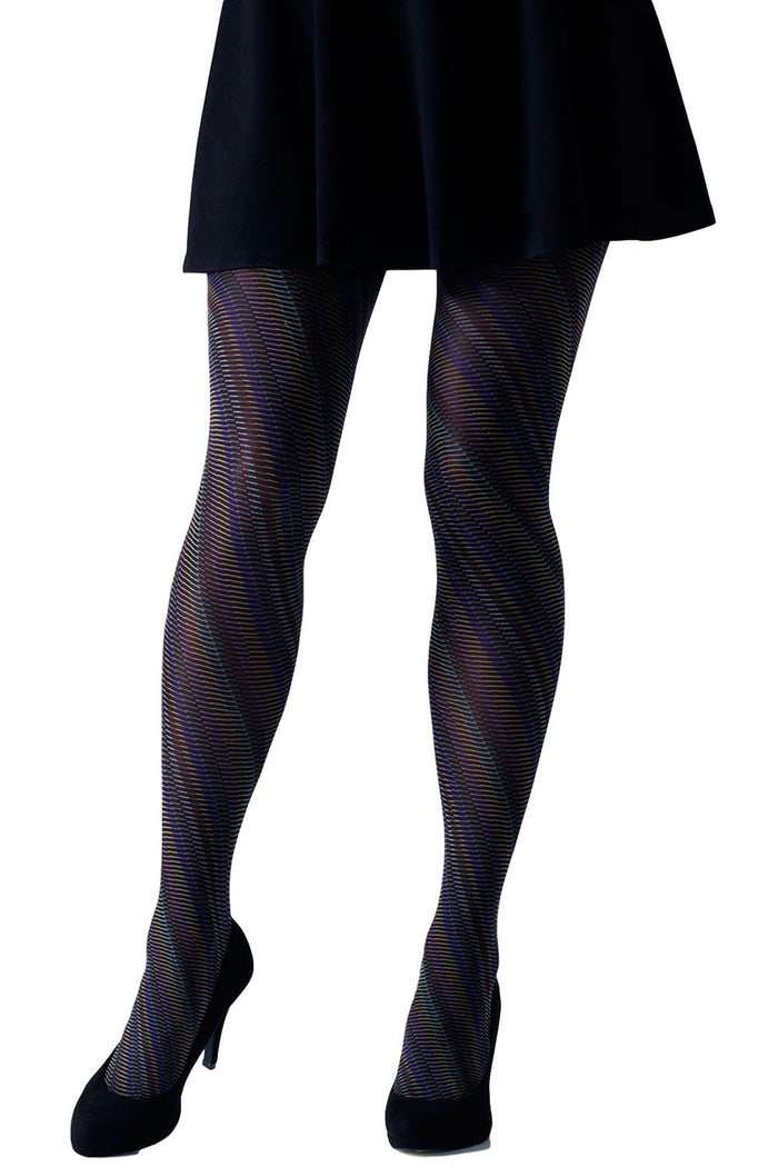 Gipsy spiral patterned tights worn with a black skirt on a white backgroound