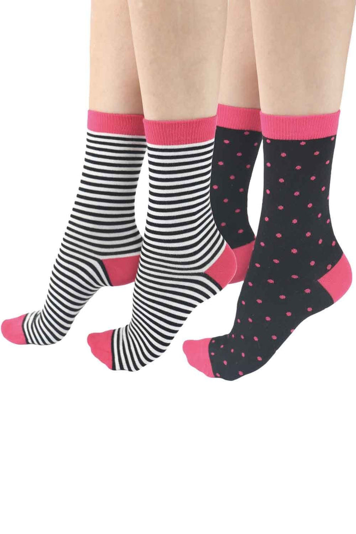 Two pairs of socks with black and white stripes and pink accents, and black polka dots with pink accents on a white background.