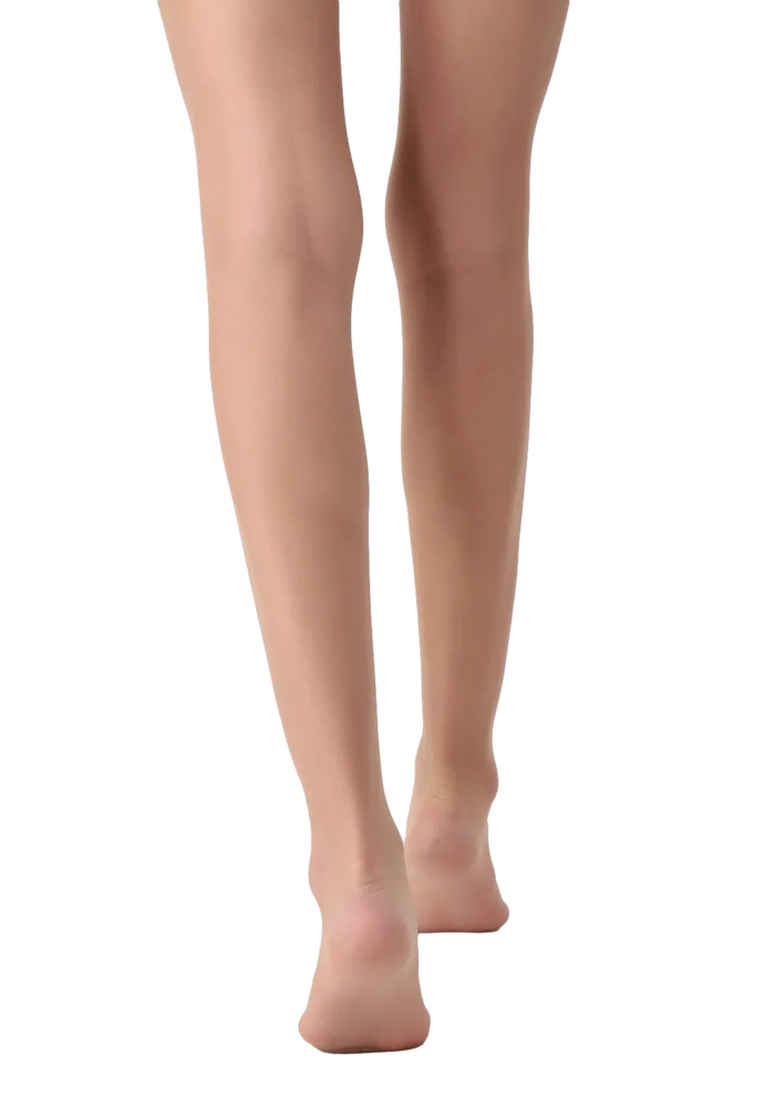 Beige tights worn by a person on a white background