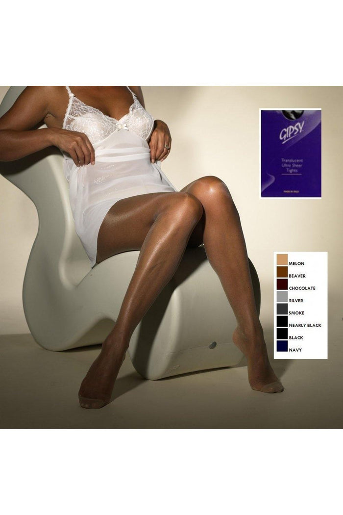 Model wearing sheer brown tights sitting on a chair with a Gipsy brand card in the corner.