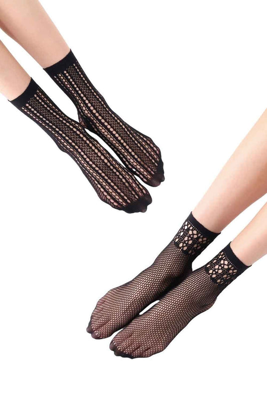 Black patterned net socks worn by a person on a white background