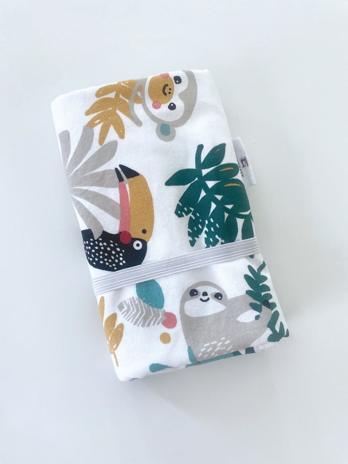 Waterproof changing mat in tropical pattern