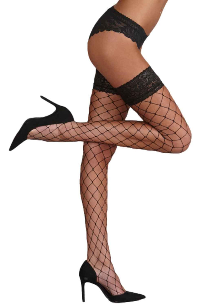 Black whale net  lace top hold ups  worn by a person on a white background
