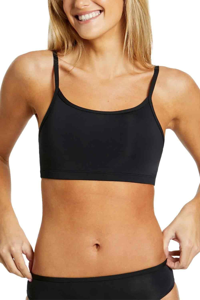 Woman wearing a black love luna womens swim bikini top  on a white background